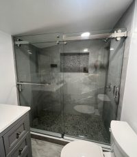 Belmont Dual Barn Door Slider Frameless Shower Door