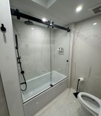 Belmont Dual Barn Door Slider Frameless Shower Door